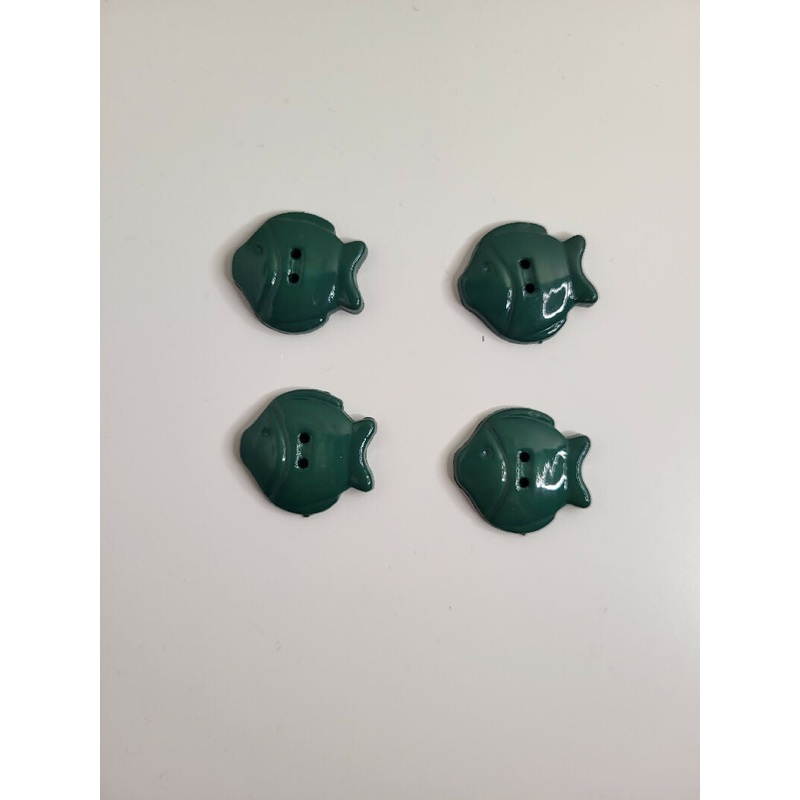 Green plastic fish buttons, set of 4.