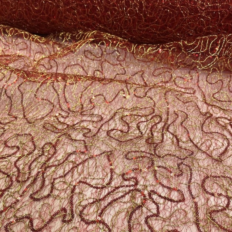 Bedazzle Wholesale Fabric in Red Gold