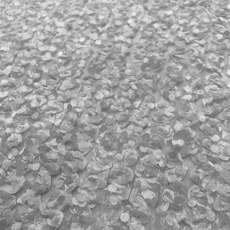 Mini Petals On Mesh Wholesale Fabric in White