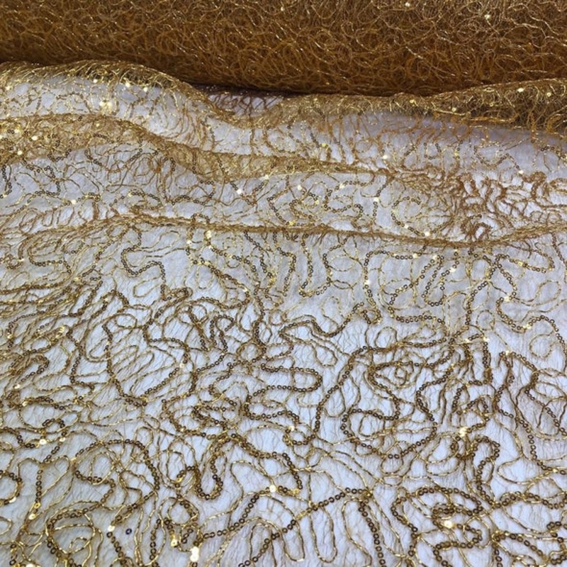 Bedazzle Wholesale Fabric in Gold 24K