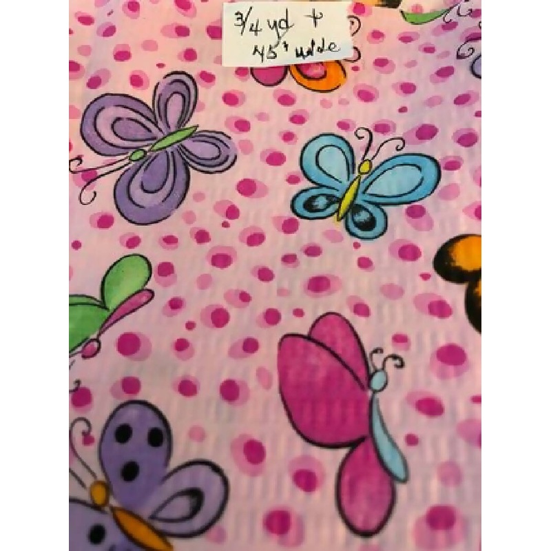 Seersucker pink with multi colored butterflies 3/4 yd 45 wide